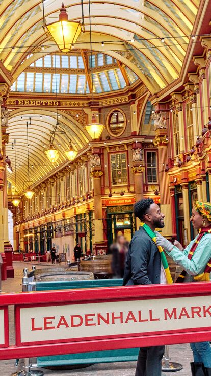 A couple at the entrance of Leadenhall Market