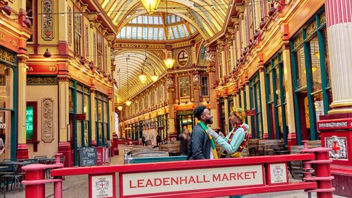 A couple at the entrance of Leadenhall Market