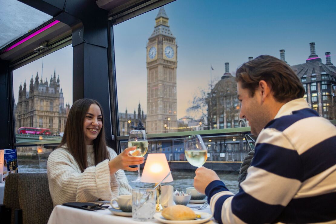 A couple enjoying a date in London with a view of Big Ben