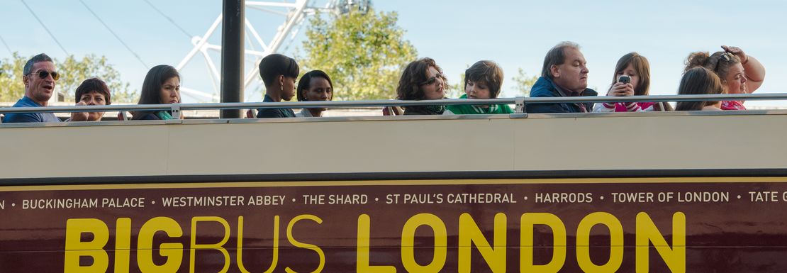 The big bus london bus cruises through London showing visitors a good time