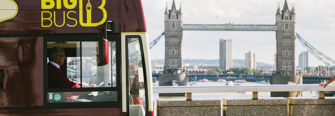 Tower Bridge and the RIver Thames are viewed from the Big Bus Tour