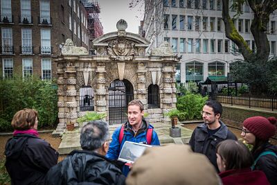 A tour group walking around York Gate