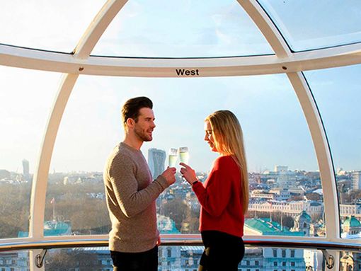 The lastminute.com London Eye Champagne Experience _ Merlin 1 _ A couple toasting in a London Eye pod