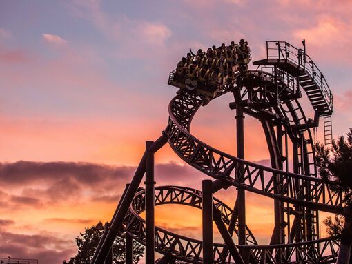 The Smiler ride at Alton Towers against a sunset background seems rather spooky