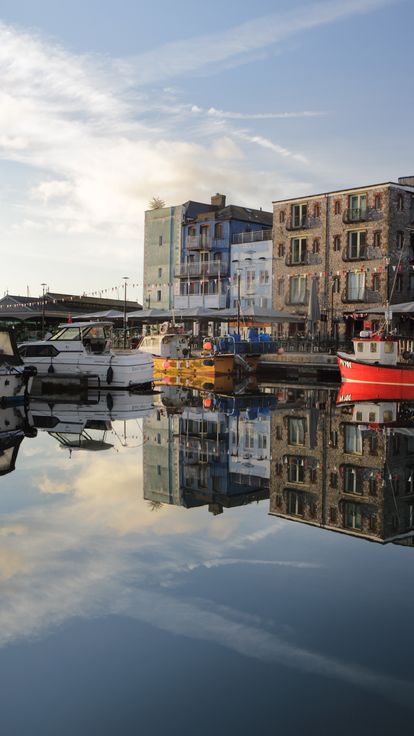 Harbour with boats and shops and cafe's at Plymouth Barbican