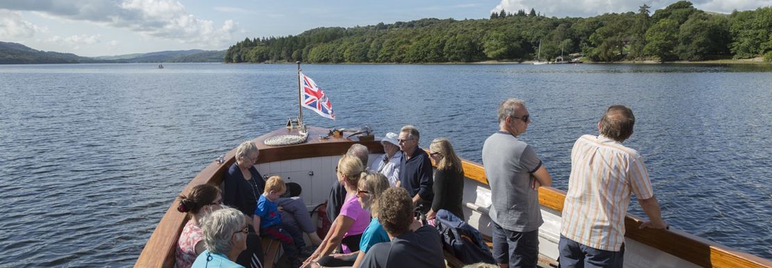 Passengers on the Northern ferry boat in Coniston Water at the Lake District
