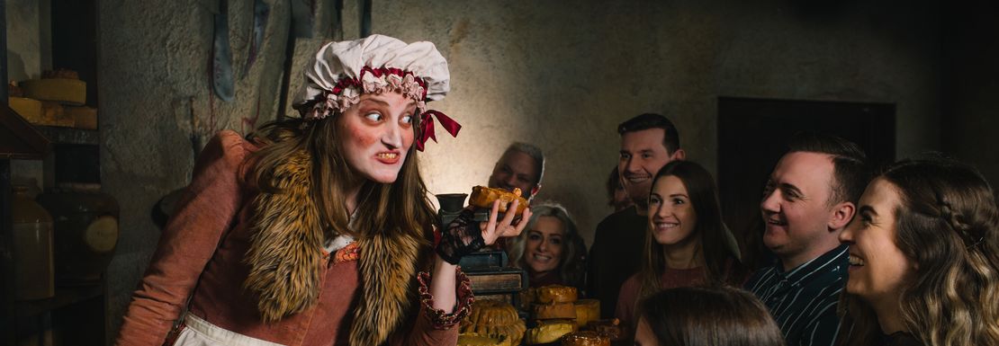 Mrs Lovett at her pie shop with guests at London Dungeon