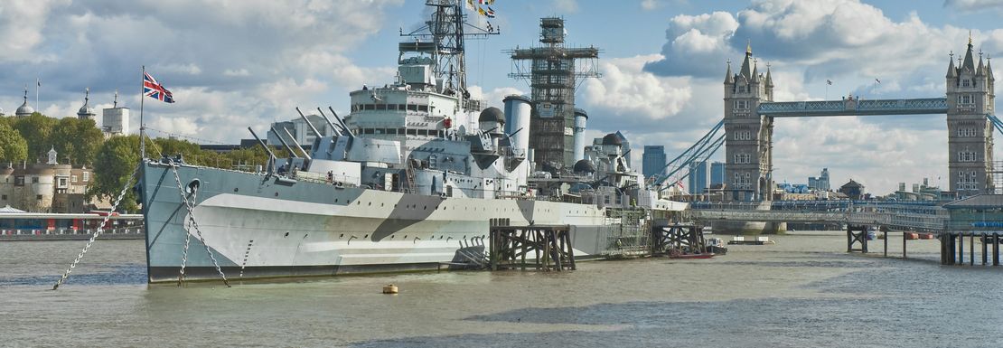 HMS Belfast _ Golden Tours _ The Royal Navy's ship at its dedicated pier near the Tower Bridge _ 4 _ shutterstock image