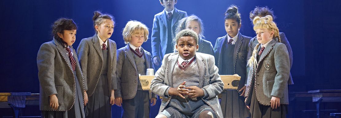 The children at Matilda's school gather to support their tortured schoolmate