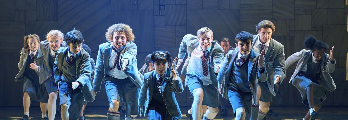 Matilda the Musical is filled with singing and dancing by child and adult actors