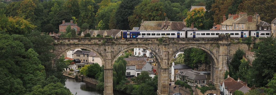 BritRail England M-Pass _ ACP _ Train over a bridge in Knaresborough