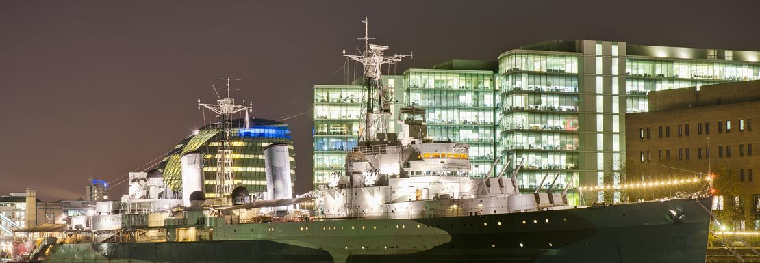 HMS Belfast at night by the river Thames