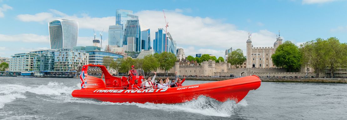 A Thames Rockets speedboat travels past London sights along the Thames