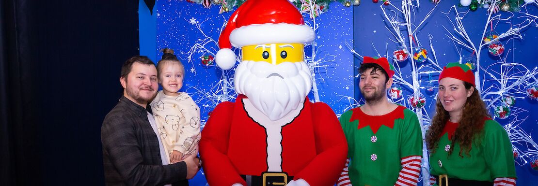 A family meeting LEGO Santa at the LEGOLAND® Discovery Centre Birmingham Christmas event