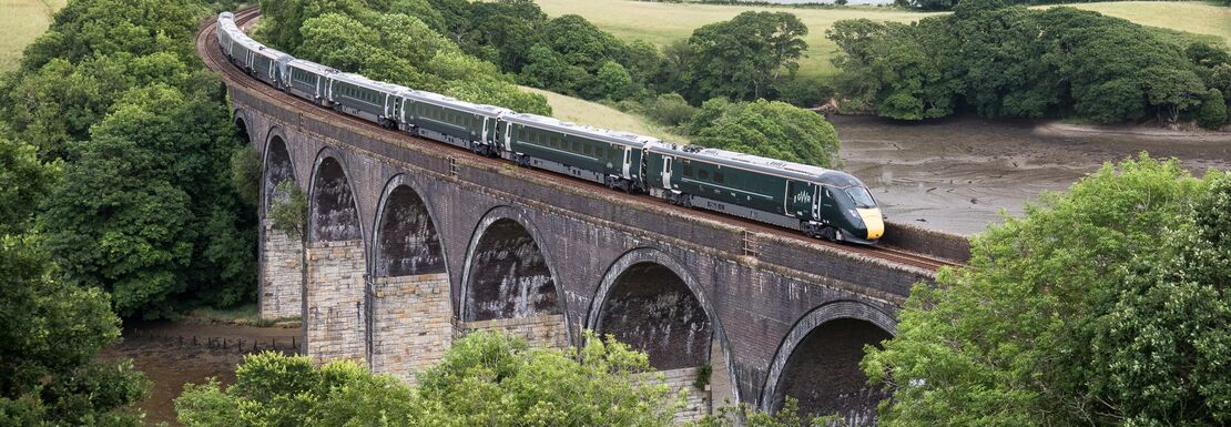 A South West trains drives over an old roman bridge in England