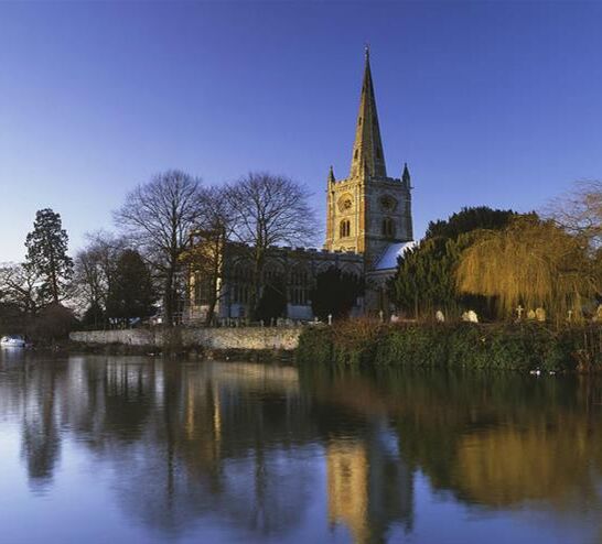 Holy Trinity Church reflected in the River Avon in Stratford-upon-Avon